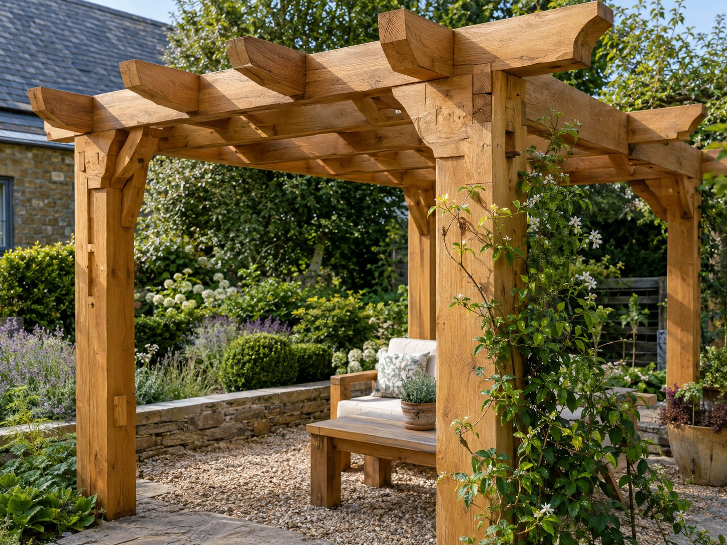 Oak timber pergola with visible mortise and tenon joinery over a gravel seating area